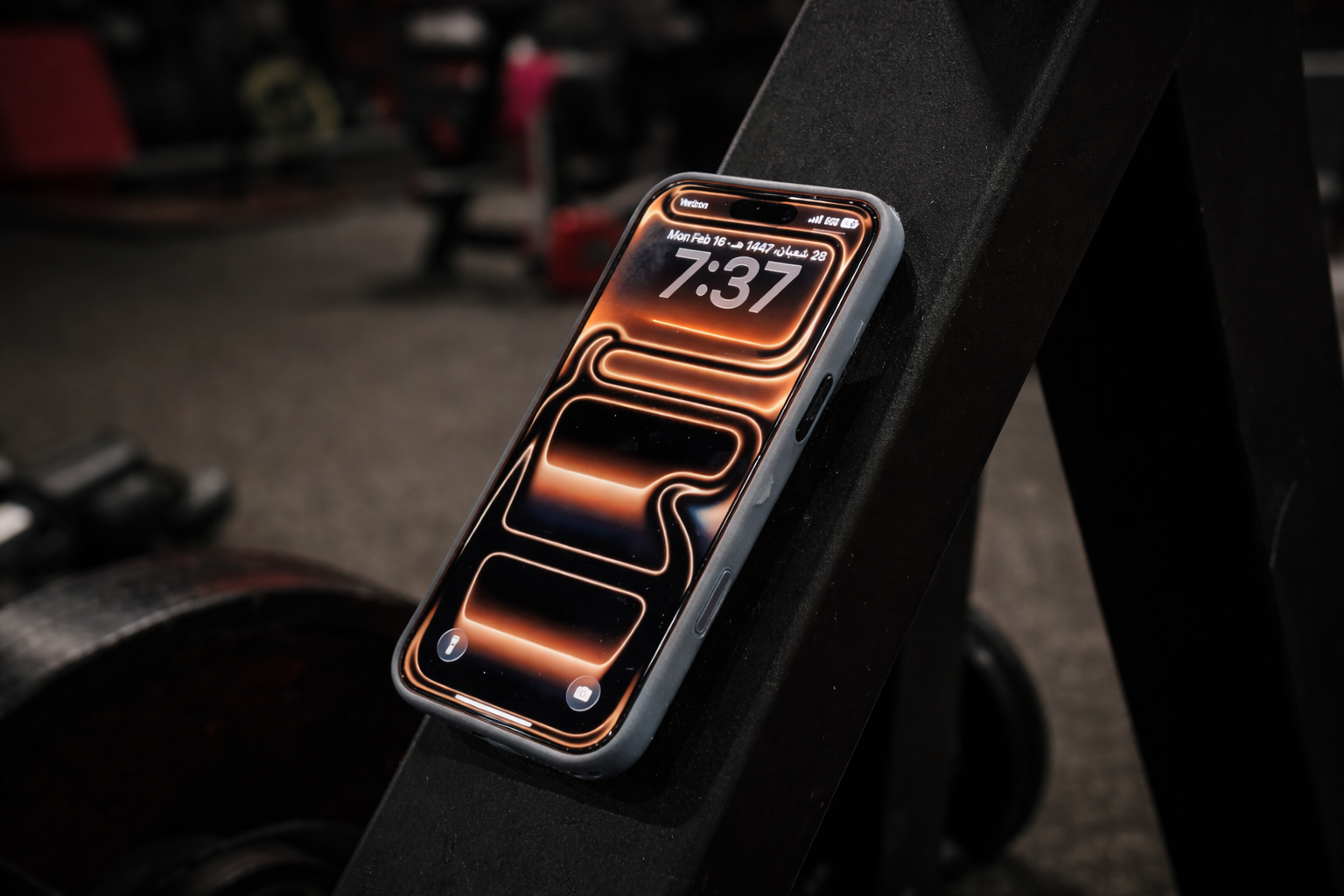 Phone mounted to a MOJO Mount magnetic phone mount in the gym